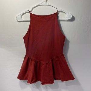Urban Outfitters red sleeveless top.